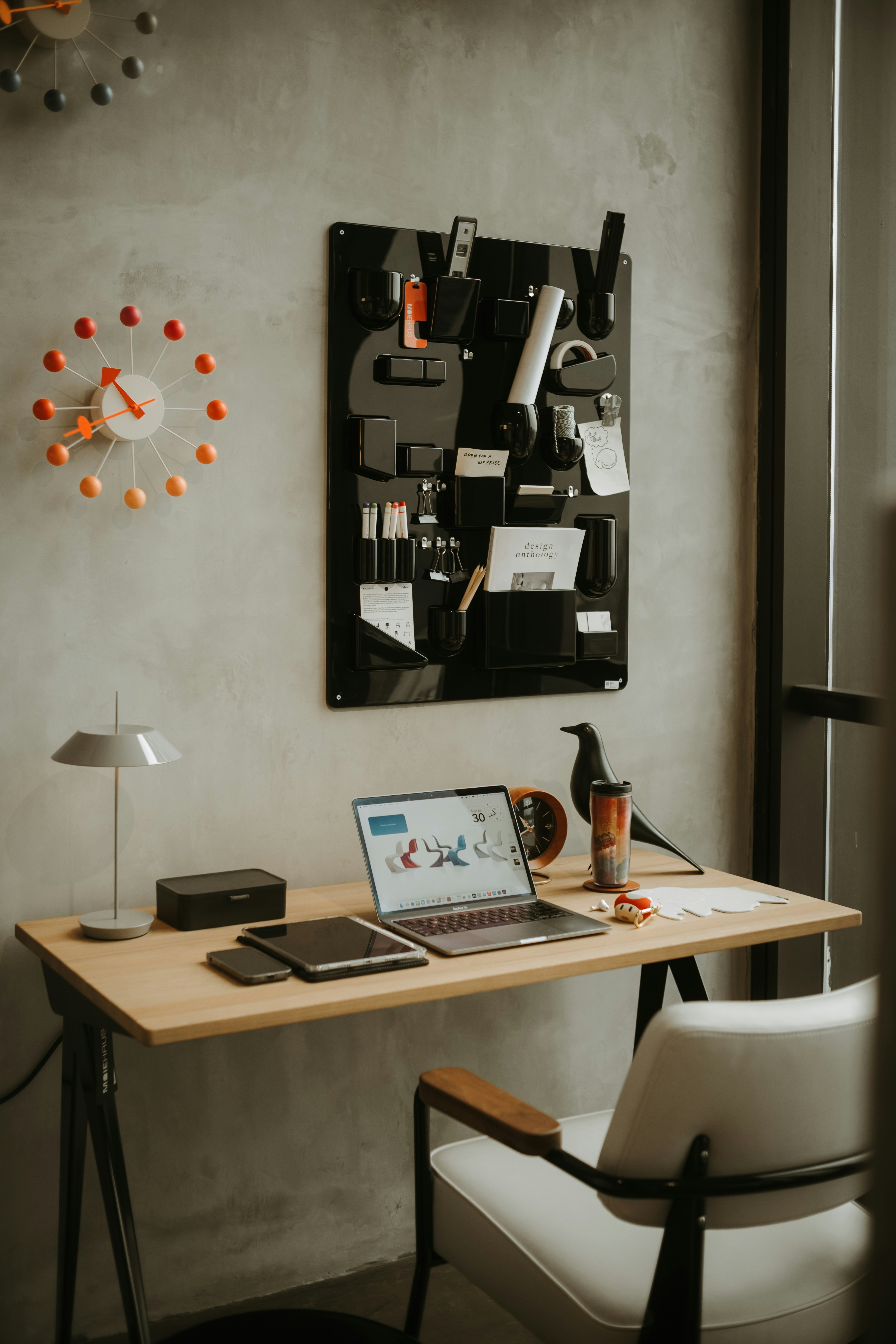 Modern organized creator workspace with laptop